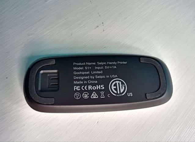 Bas du support de l'imprimante